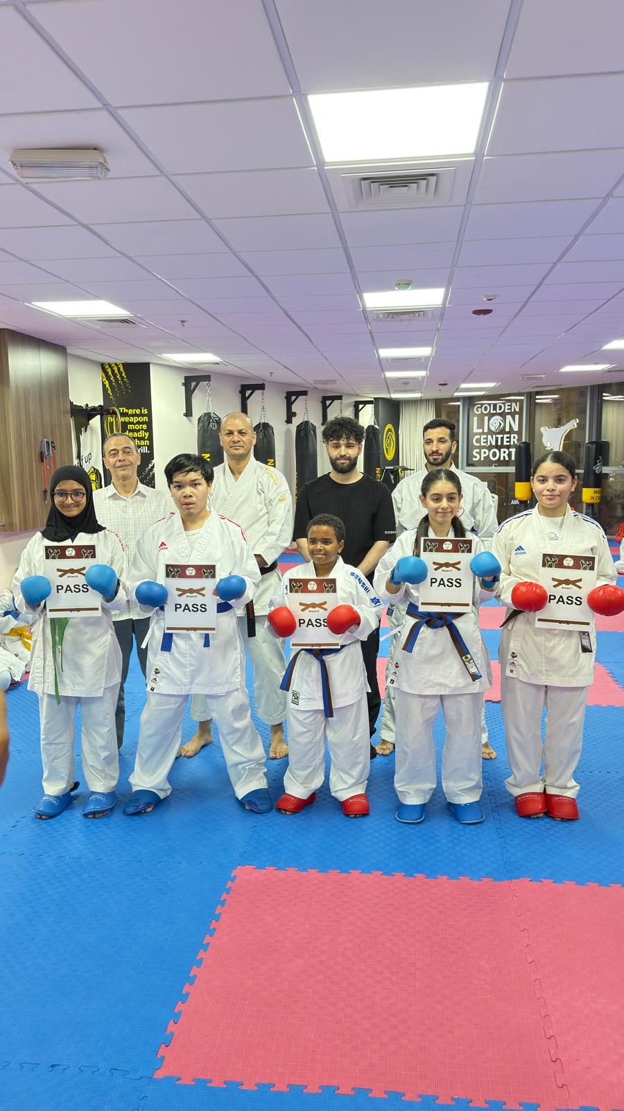 Students passing their belt grading at Golden Lion