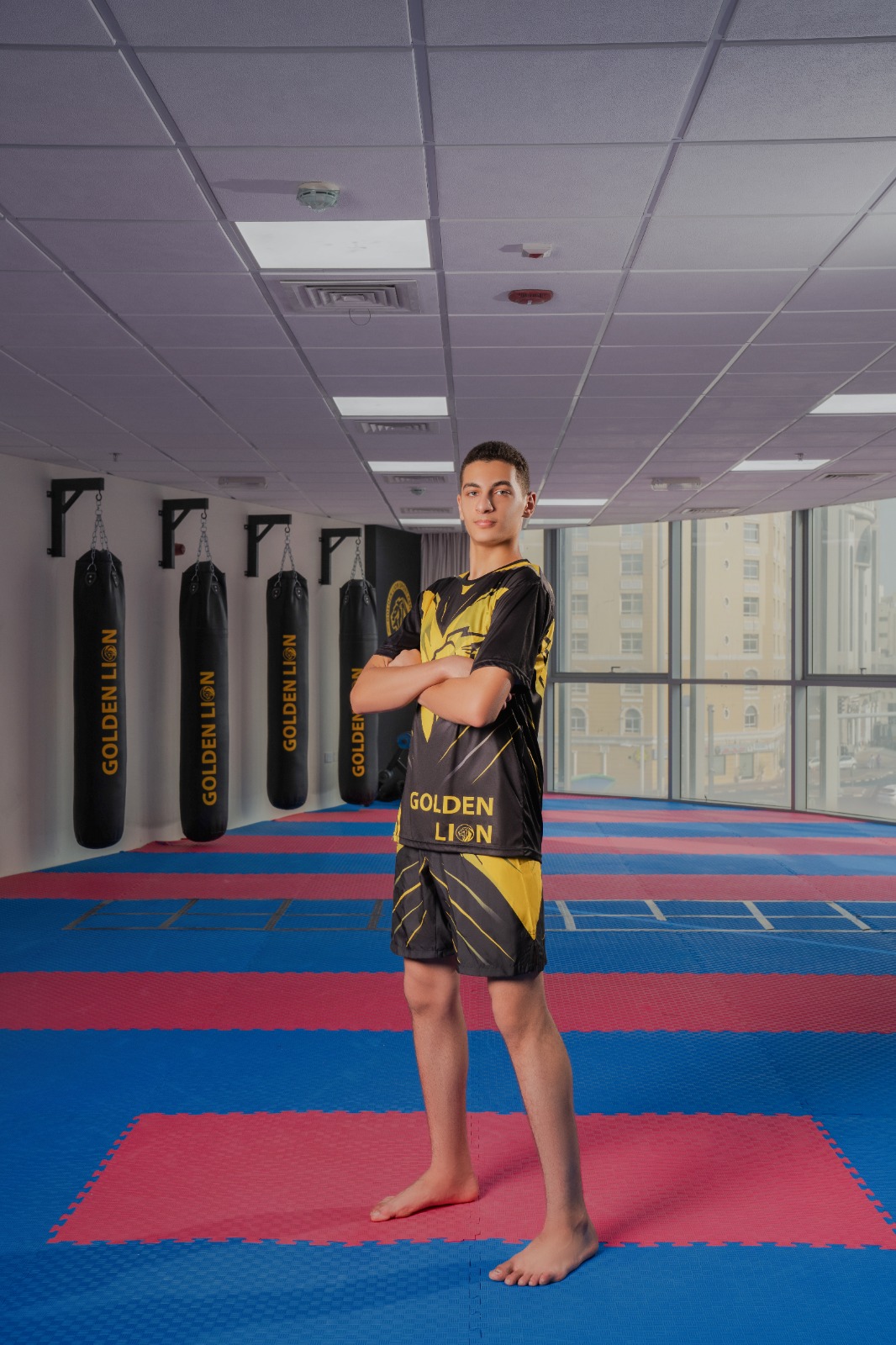 Student in Golden Lion team kit